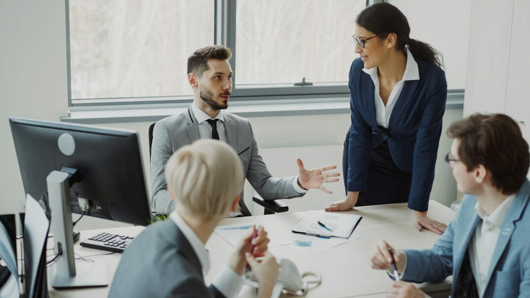 person speaking in meeting