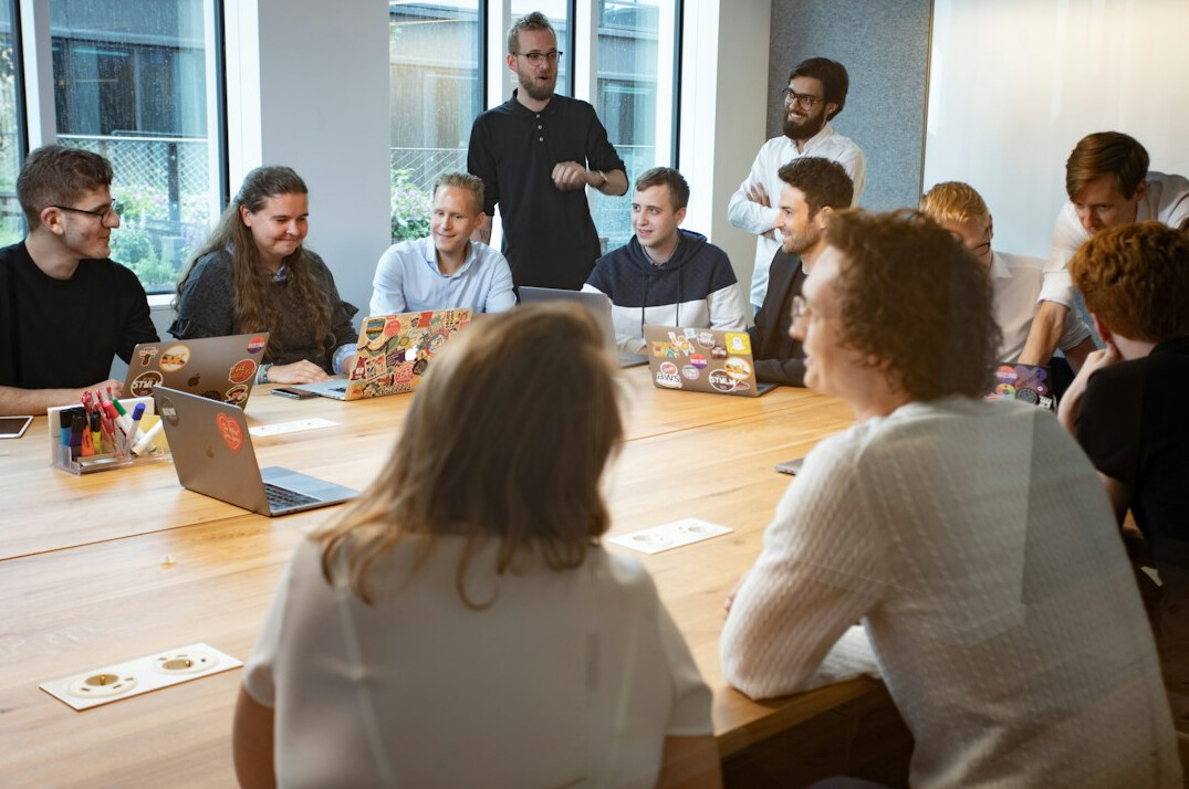 person speaking in meeting