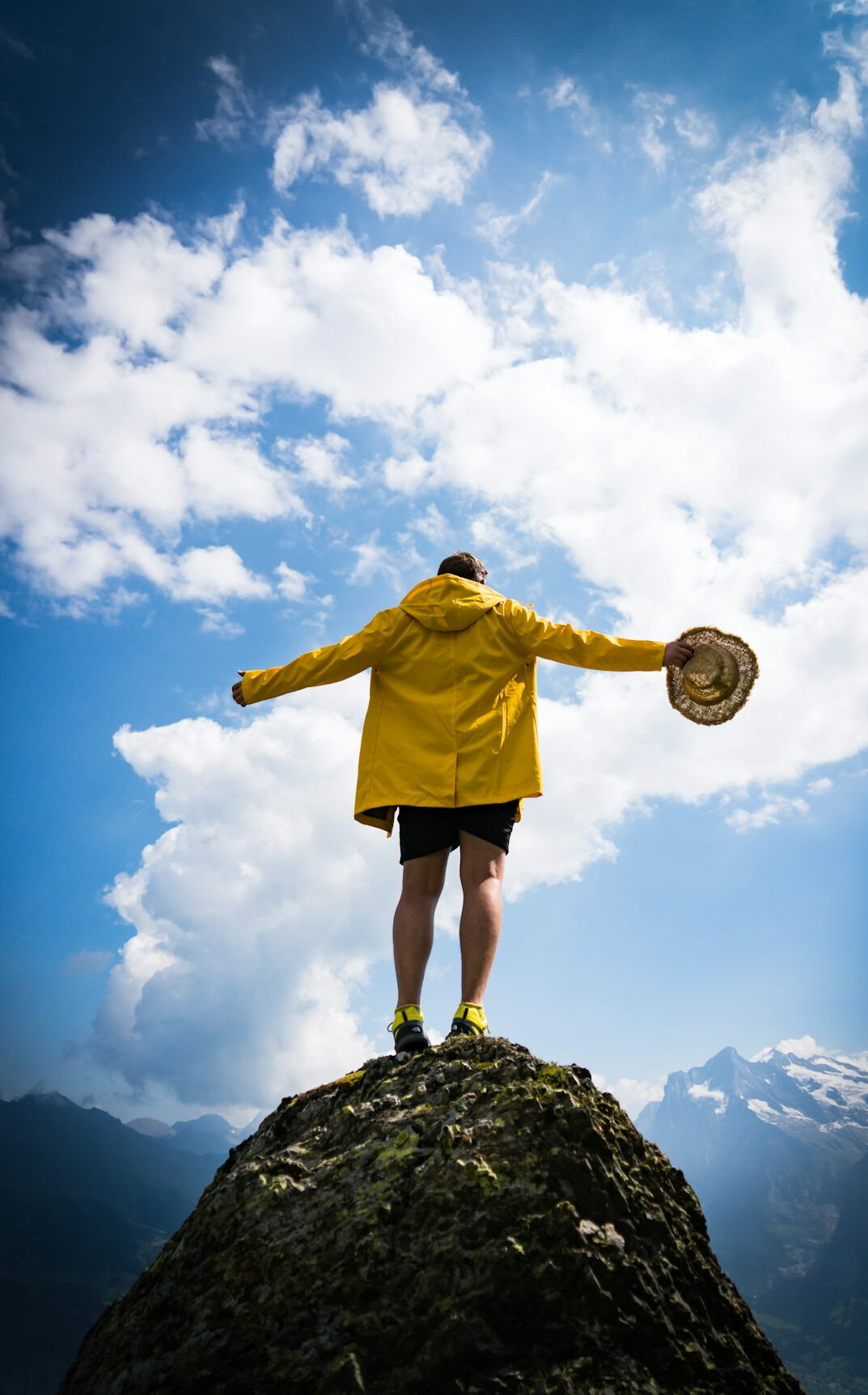 person achieving goals outdoors