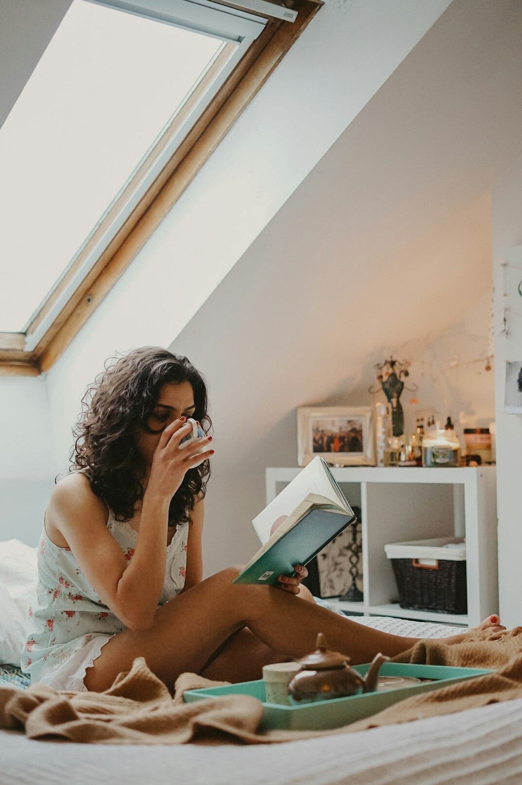 person reading book thoughtfully
